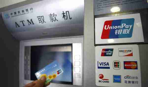 招商银行卡可以在农业银行ATM机上存取款吗？